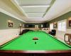 Snooker ace John Higgins hopes to pocket £825,000 for his luxury mansion
