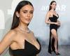 Nina Dobrev sets pulses racing in a plunging black gown with a dramatic thigh ...