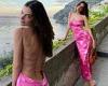Emily Ratajkowski shows off her stunning curves in a backless pink slip dress ...
