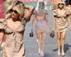 Ashley Roberts flashes her legs in a brown puff-sleeve dress on her way to her ...