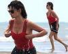 Penelope Cruz shows off her phenomenal figure in a scarlet Versace swimsuit