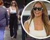 Jennifer Lopez flashes her megawatt smile on her way into her office in West ...