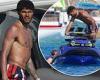 England player Tyrone Mings lives it up in Ibiza as he enjoys a jet ski ride