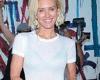 Former Neighbours star Nicky Whelan flashes her bra in a sheer top