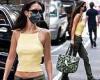 Bella Hadid shows off her toned abs in low-rise green cargo pants as she heads ...