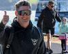 Cricketer Michael Clarke is every inch the daggy dad on walk with daughter