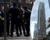 Woman holding her dog leaps to her death from 46-story building in New York's ...