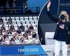 Athletes on U.S. swimming team chant 'Dr. Biden' for First Lady as she watches ...