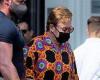 Elton John, 74, catches the eye in a brightly patterned Gucci shirt