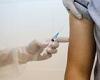 Less than a third with allergic reaction to first COVID vaccine dose have one ...