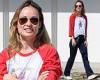 Olivia Wilde models a shirt that says 'I'm With Her' in French after supporting ...