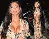 Nicole Scherzinger shows off her summer glow in a low-cut dress while back in ...