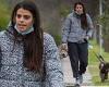 The Bachelor's Brooke Cleal rugs up in a puffer jacket as she takes her dogs ...
