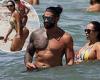 WWE star Roman Reigns shows off his buff physique while wife Galina Becker ...