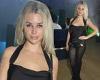 Lottie Moss teams a black silk top with just knickers, suspenders and tights at ...