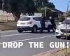 Shocking moment alleged car thieves pull a gun on cops in Sydney