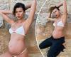 Pregnant model Georgia Fowler flaunts her blossoming bump on the beach