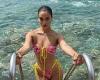Shanina Shaik shows off her incredible figure in a bikini during a trip to Havar