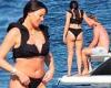 Jess Wright wears a frilly black bikini during boat day with fiancé William ...