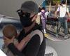 Katy Perry cradles baby daughter Daisy as she arrives in Capri with fiancé ...