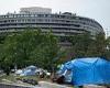 In the shadow of Watergate: Homeless encampment near complex one of many in ...