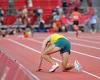 Inspirational moment Australian distance runner gets up and finishes 10,000m ...