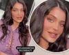 Kylie Jenner dazzles in a lilac cut-out dress that flashes her cleavage