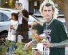 Machine Gun Kelly looks like quite the cool dad in punky attire during day with ...