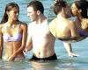 Shirtless Rocco Ritchie packs on the PDA with mystery brunette during beach day ...