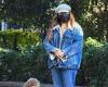 Jessica Mauboy goes undercover in a matching jean ensemble, mask and cap