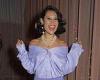 Raye nails retro glamour in a lilac satin blouse and mini skirt