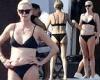 Charlize Theron stuns in a black bikini as she larks about on luxury yacht with ...