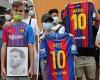 sport news Barcelona fans gather outside Nou Camp with Lionel Messi shirts and banners
