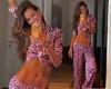 Izabel Goulart showcases her supermodel abs in stunning purple co-ord in Germany