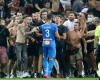 French fans storm pitch in football match after player throws back bottle that ...