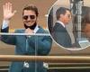 A dapper Tom Cruise waves to fans as filming for Mission Impossible 7 continues
