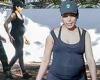 Freida Pinto shows off her burgeoning baby bump in activewear as she steps out ...