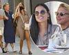 Demi Moore, 58, is youthful looking as she flashes a toned leg with a handsome ...