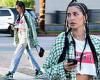 Nicole Williams struts her stuff in 90s chic crop top and baggy jeans after a ...