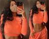 Kylie Jenner shows off midriff in orange crop top and sweats in throwback snap ...