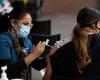 Warnings thousands of Telstra workers will HAVE to get a Covid vaccine jab or ...