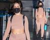 Camila Cabello shows off her toned abs in dusky pink sportswear as she touches ...