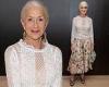 Dame Helen Mirren, 76, looks typically elegant in a floral satin skirt and chic ...