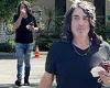 KISS frontman Paul Stanley wipes his nose as he approaches LA restaurant ...