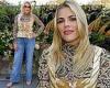 Busy Philipps rocks animal print blouse with jeans at Ulla Johnson show during ...