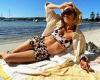 Pip Edwards shows off her incredible abs in an animal print crop top and bike ...
