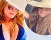 'Cooling down': Carol Vorderman, 60, showcases her VERY ample assets in a navy ...