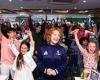 Britain goes wild for Emma Raducanu as fans crowd around TVs to cheer her on in ...