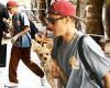 Justin Bieber cuts a casual figure as he sweetly holds he and wife Hailey ...