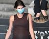 Heavily pregnant Georgia Fowler dons $750 designer shoes as she takes her ...